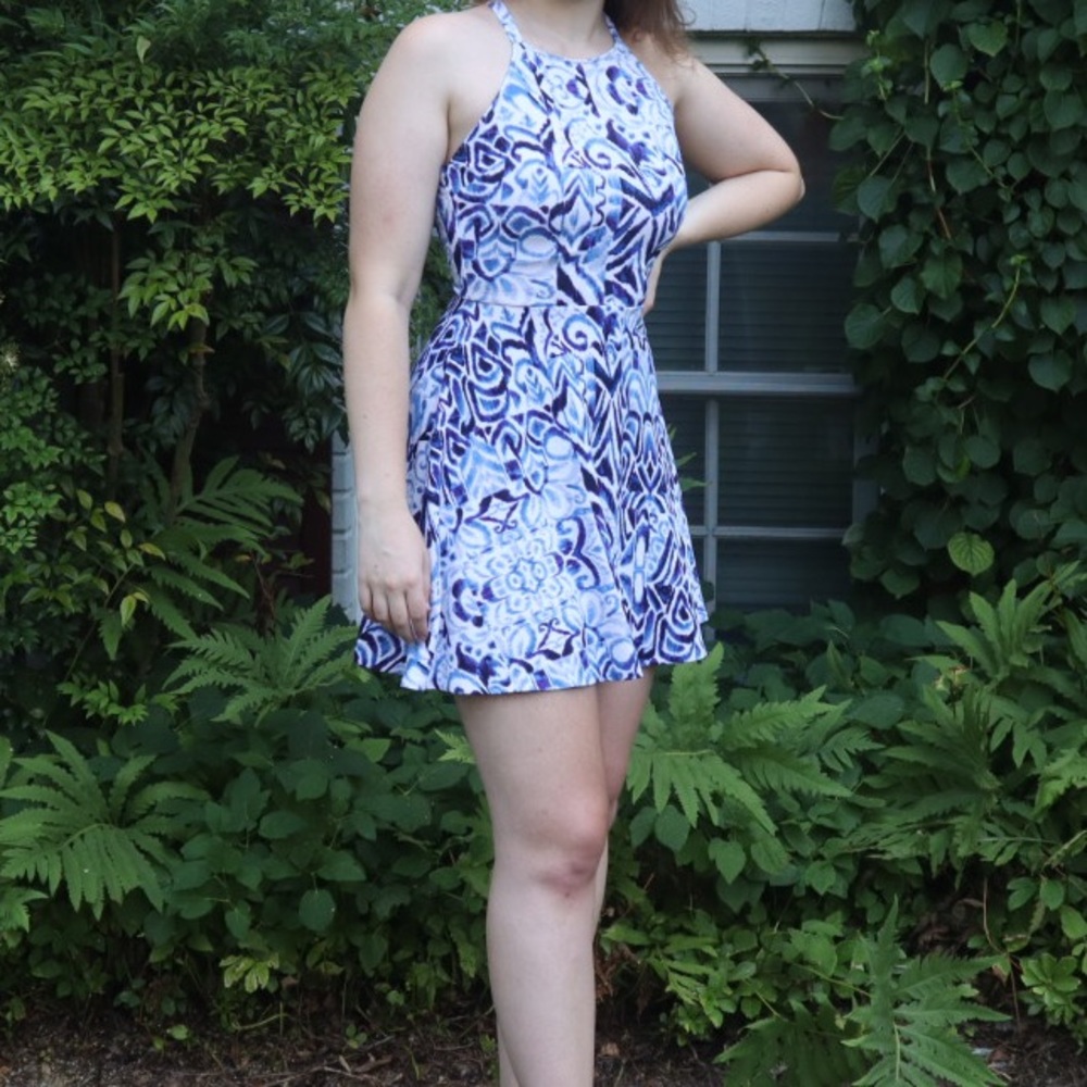 Blue and white pattered dress with high neck